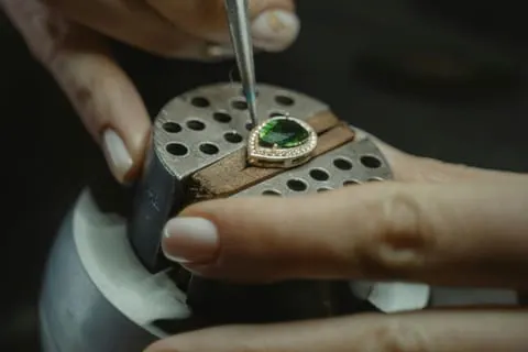 A stone chosen at source, and set by a goldsmith into something made for it before you leave.