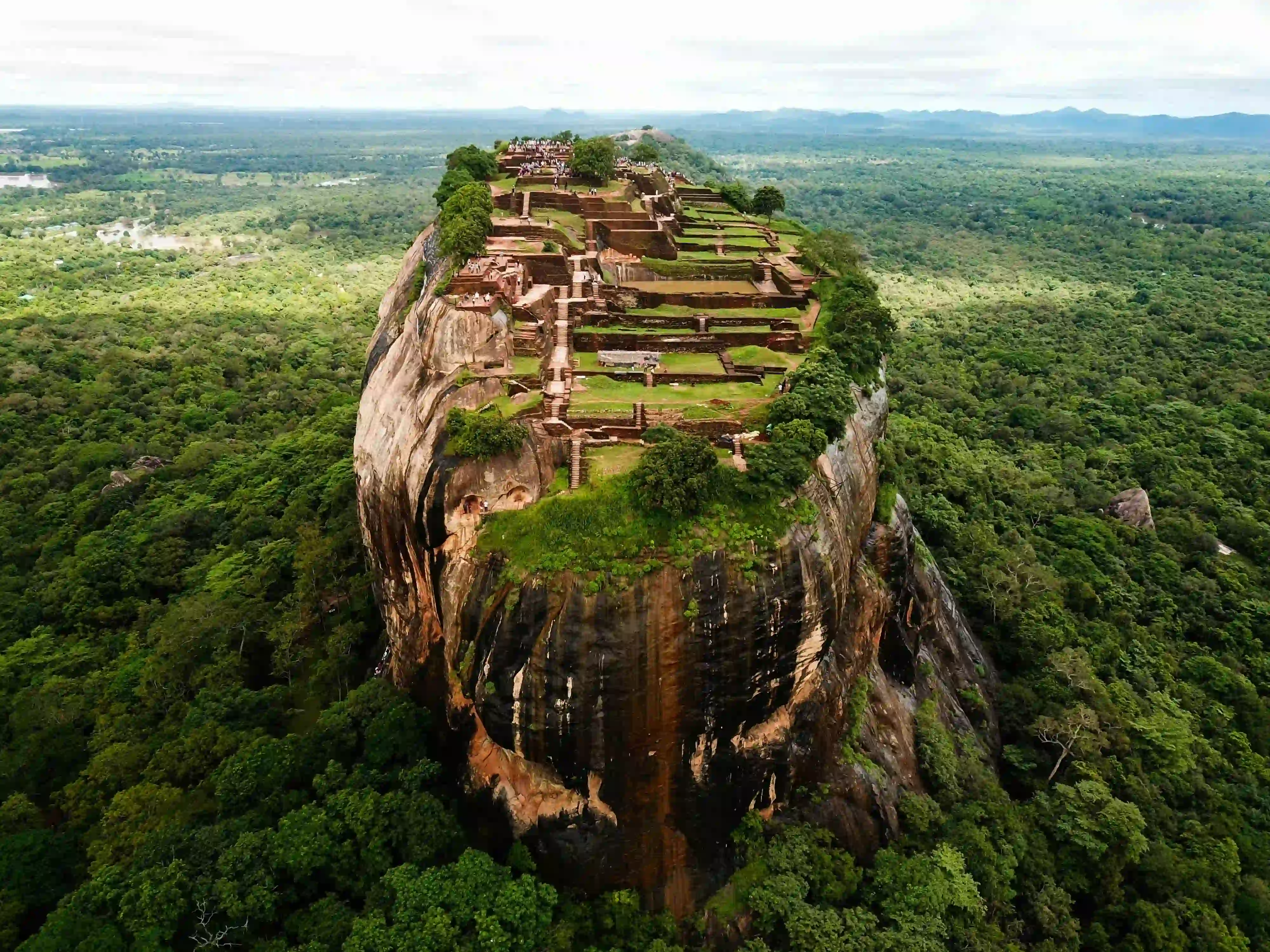 Sigiriya Rock Fortress rising above the surrounding jungle