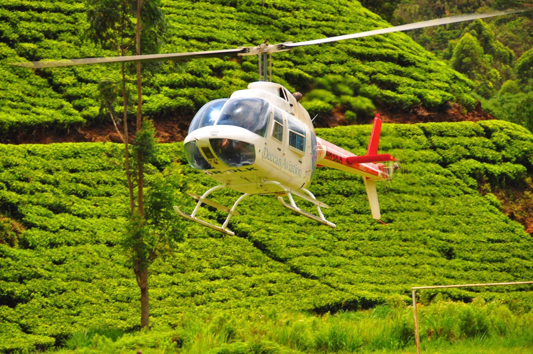 The coast-to-hills drive is five hours of hairpins. By helicopter it is twenty minutes, and you arrive having seen the whole ascent from above. Point to point, on your own schedule.